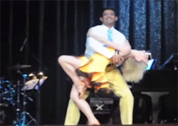 Felon Dinesh D’Souza dances