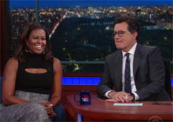 Michelle Obama does impression of her husband / President for Stephen Colbert
