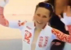 Olympic Bronze Medal Speed Skater Olga Graf's Bare Chested Victory Lap