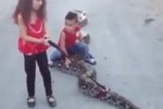 Palestinian Girl, Baby Brother Play With & Ride Huge Snake! 