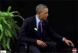 Zach Galifianakis between two ferns with President Obama