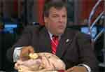 fat man Chris Christie buttering a turkey